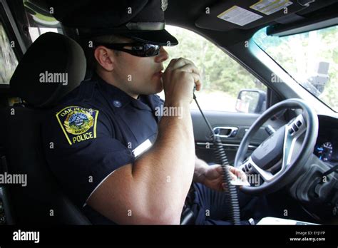 Police Officer Speaking On A Police Radio Oak Bluffs Massachusetts