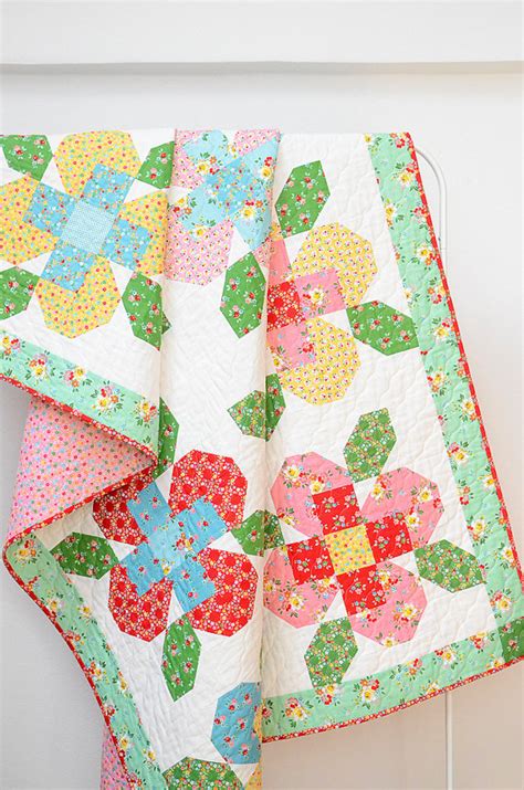 Maybe you would like to learn more about one of these? Pieced Flowers Make a Pretty Quilt (and Mini!) - Quilting ...