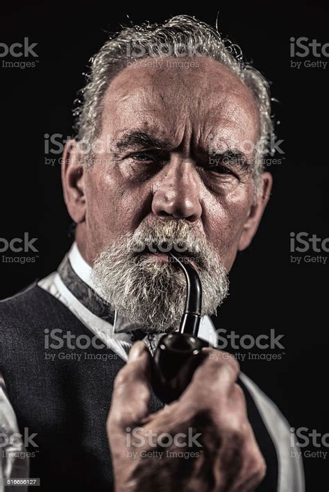 Pipe Smoking Vintage Characteristic Senior Man With Gray Hair Stock