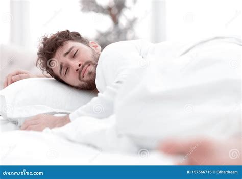 Closeupthe Tired Men Sleep Soundly On The Bed Stock Image Image Of