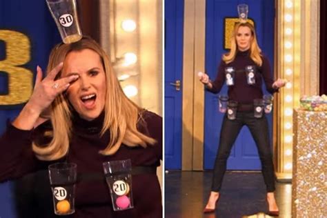 Amanda Holden Catches Ping Pong Balls In Pint Glasses Attached To Her