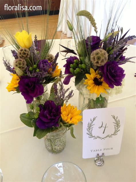 Maybe you would like to learn more about one of these? Rustic mason jars with flowers, pod sand berries for that ...