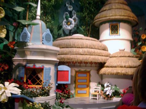 Transport your audience to the magical land of oz with this munchkinland theatrical backdrop. MGM Day - Great Movie Ride - Wizard of Oz scenery ...