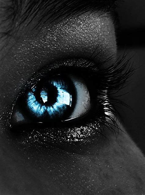 Blue Glowing Eyes In The Dark