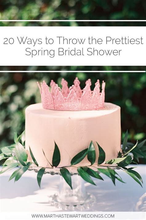 A Wedding Cake With Pink Frosting And Greenery On Top The Words 20