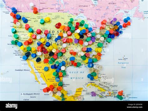 Many Colourful Pins In A Wall Map Of America The Map Is Hanging On The