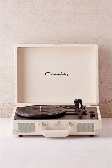 Presented in retro suitcase shells, you can 'amplify your style' with its colourful designs. Crosley UO Exclusive Cream Canvas Cruiser Bluetooth Record ...