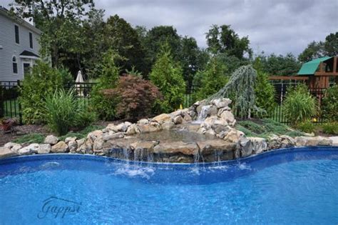 Swimming Pool Moss Rocks Waterfall Built By Gappsi Landscaping On Long
