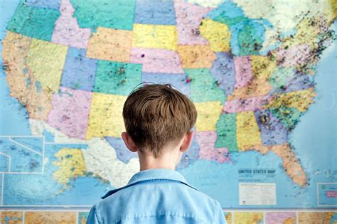 Boy Stands Looking At A Map Of The United States By Cara Slifka Tax Guide United States Map