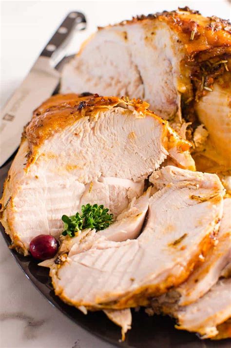 Roast the turkey for 20 minutes per pound. Roasted Turkey Breast {SO Juicy!} - iFOODreal