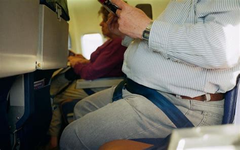 ‘squashed Australian Sues American Airlines After He Was Seated Between Obese Passengers For 14