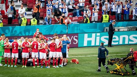 Spieler und fans sind geschockt, das spiel wird unterbrochen. EM 2021: Drama um Christian Eriksen - Spielfortsetzung ...