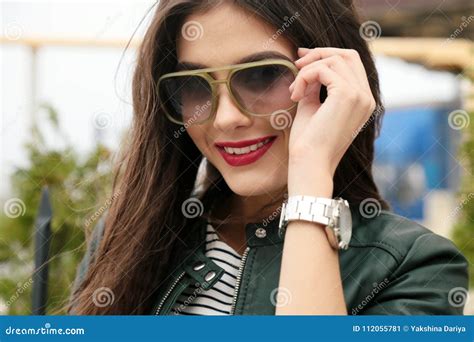 Beautiful Girl With Dark Hair In Casual Clothes Posing Near Auto Stock Image Image Of Glowing