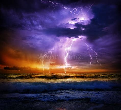 Lightning And Storm On Sea To The Sunset Stock Photo Image Of