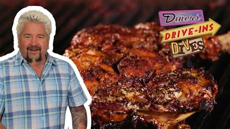 guy fieri eats jamaican jerk chicken diners drive ins and dives with guy fieri food network