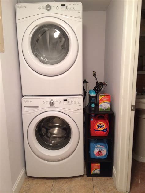 Stacked Washer And Dryer Organization For Small Space In Closet Small Laundry Room