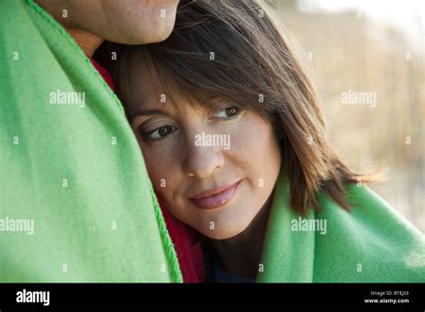 Woman Resting Head On Husbands Chest Portrait Stock Photo Alamy