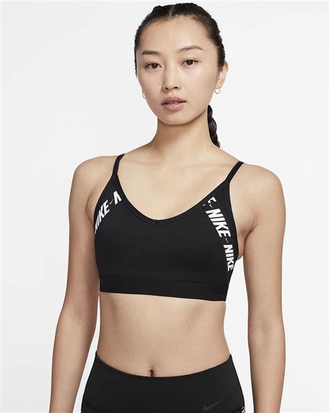 Working out can be tough if you don't have the support you need. Nike Indy Women's Light-Support Logo Sports Bra. Nike SG