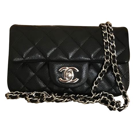 Timeless Chanel Extra Mini Classic Flap Bag In Black Caviar Leather