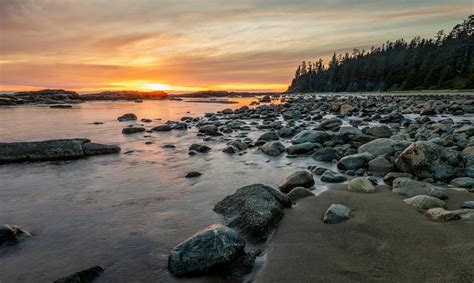 Rocky Shore With Rocks On The Shore During Sunset · Free Stock Photo