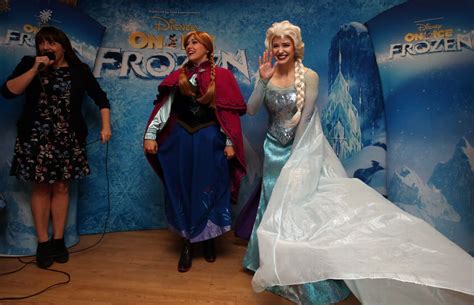 Children Meet Characters Anna And Elsa From Disneys Frozen On Ice At