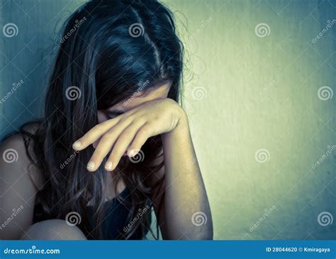 Lonely Girl Crying With A Hand Covering Her Face Stock Photo Image Of