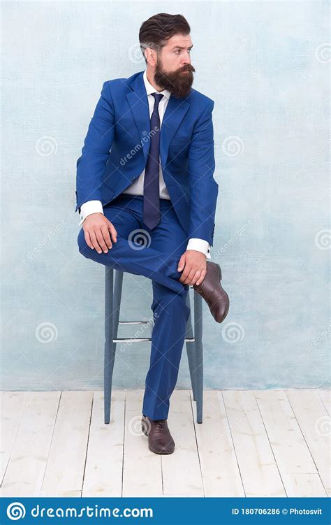 Classy And Formal Bearded Man Wear Formal Suit Elegant Lawyer Sit On Chair Dressing Up For