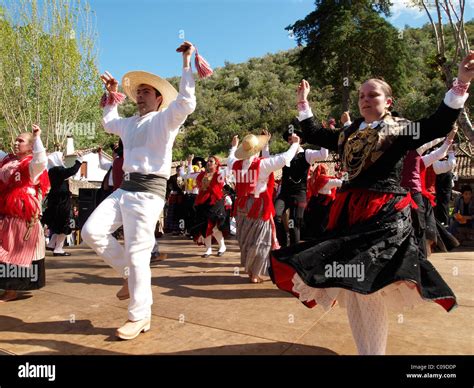 Portuguese Folk Dancers In Traditional Costume At The Festa Da Fonte