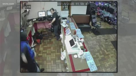 Surveillance video of Charlotte armed robbery at Mr. C's | wcnc.com