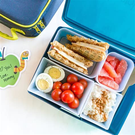 The first page shows all four meals organized around a clock to show sequence and general mealtimes. Breakfast-for-Lunch Bento for Kids Recipe - EatingWell