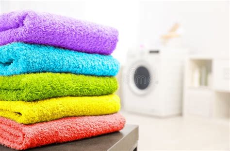 Stack Of Clean Towels On Table In Laundry Room Stock Image Image Of