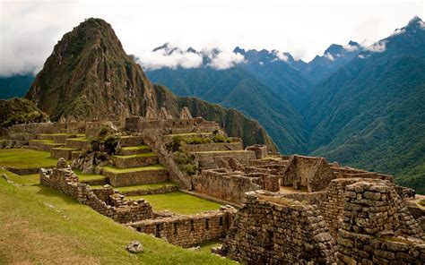 Machu picchu, an inca sacred place in the andean mountains of peru was discovered by yale archaeologist hiram bingham in 1911, and are one of the most beautiful and enigmatic ancient sites. Machu Picchu, Peru