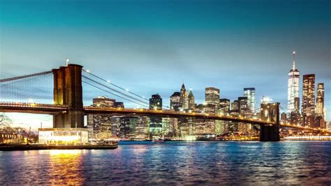 Timelapse With Brooklyn Bridge And Lower Manhattan Going Through Sunset