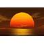 Orange Sun Setting Over Water Facebook Timeline Cover Backgrounds 