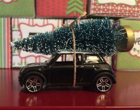 Mini Cooper Carrying Christmas Tree Ornament