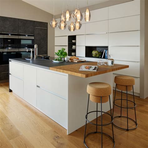 See how a standalone kitchen island can add storage, style an antique bakery table, equipped with pottery barn baskets, functions as the kitchen island in this. Kitchen Island Design Ideas - PRETEND Magazine