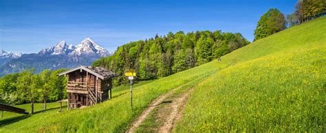 Idyllic Landscape In The Alps With Mountain Lodge In Springtime Stock