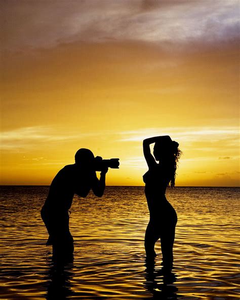Man Shooting Nude Model In Sunset License Image Lookphotos