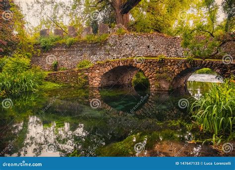 Dreamlike Medieval Fantasy Forest Fairy Landscape River Bridge Stock
