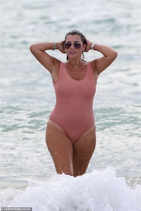 Imogen Thomas Flatters Her Curves In Nude Coloured Swimsuit In Miami