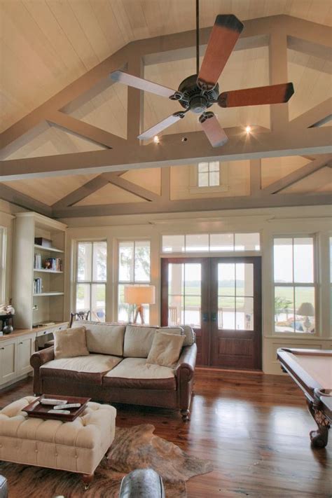Pops color vaulted ceiling rooms via. Grand Traditional Living Room With Vaulted Ceilings | HGTV