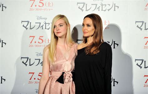 Elle Fanning And Angelina Jolie Grace Tokyo Maleficent Press