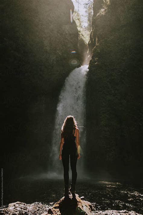 Backside Of Girl Looking At A Waterfall By Rachel Gulotta Photography Stocksy United