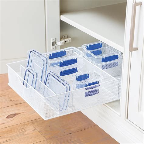 Diagonal drawer organizers make tidy cubbies for both your long cooking tools and the small ones without glass cabinet doors can be a beautiful component of kitchen cabinetry. White Mesh Food Storage & Lid Organizers | The Container Store