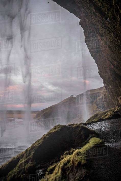 View From Behind Waterfall Seljalandsfoss Iceland Stock Photo