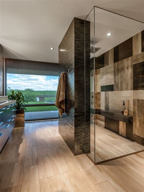 A few simplistic bathroom ideas you can incorporate are geometric shaped mirrors, showcasing concrete, wooden and other natural elements, opting for a neutral color palette and utilizing natural lighting as much as possible. 50 Modern Bathroom Ideas — RenoGuide - Australian ...