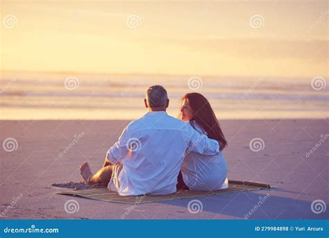 The Beach Life Sure Is The Good Life A Mature Couple Relaxing Together