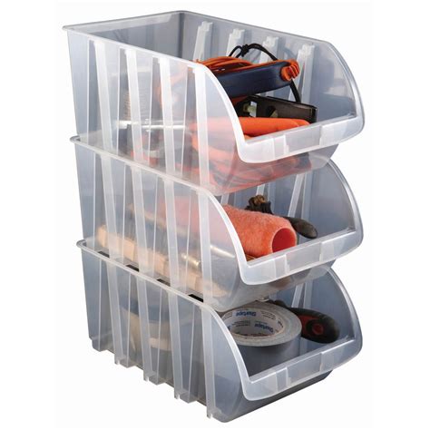 Three Tiered Storage Bins With Various Items In Each Compartment And