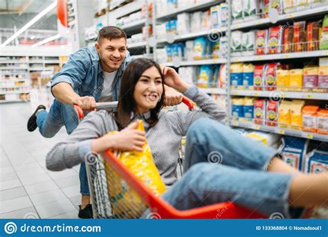Husband Carries His Wife In The Cart, Supermarket Stock Photo - Image of caucasian, healthy ...