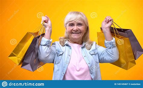 Joyful shopping apk we provide on this page is original, direct fetch from google store. Joyful Senior Female Holding Shopping Bags, Pleasant ...